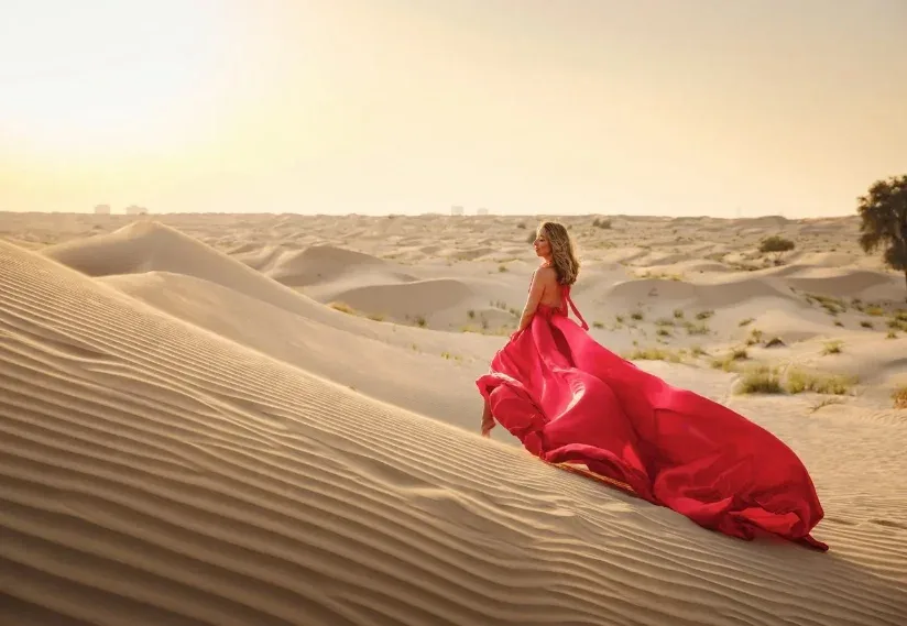 Camel ride for two across golden dunes